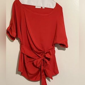 Adorable New York & Company blouse ties at waist.  Size Small, fits like Medium.